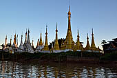 Inle Lake Myanmar. All the buildings are constructed on piles. Residents travel around by canoe, but there are also bamboo walkways and bridges over the canals, monasteries and stupas. 